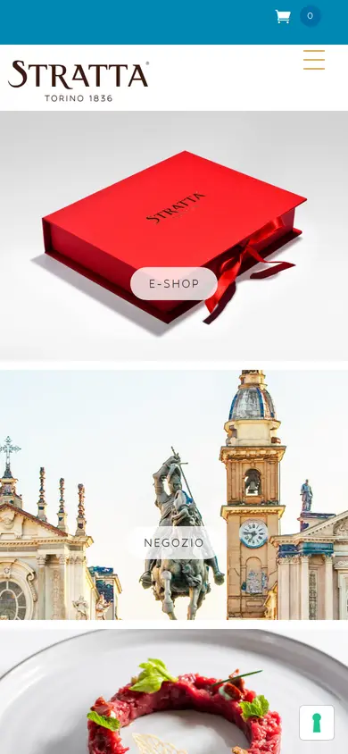 La prima schermata della home di oggi sul telefono, col banner dei cookie chiuso: la scatola rossa con la scritta e-shop e la piazza con la scritta negozio